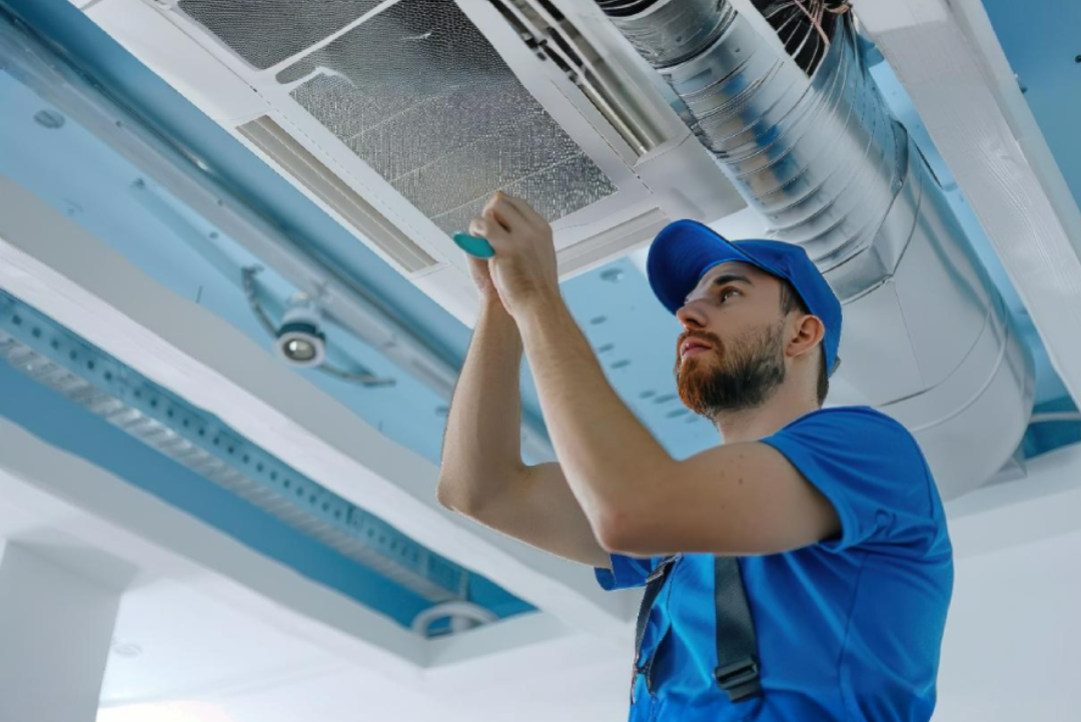 technician-inspecting-hvac-system